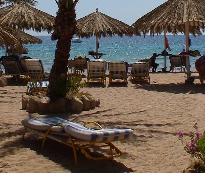 oungers on a sandy beach